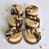 Six vegan Peanut Butter and Caramel Cheesecakes